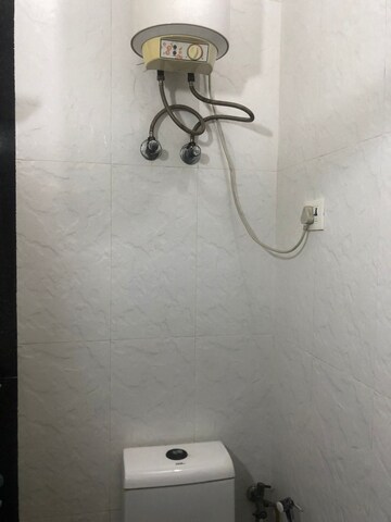 Bathroom in 2.5 BHK Builder Floor at Vile Parle West – for Rent