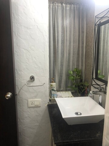 Bathroom in 2.5 BHK Builder Floor at Vile Parle West – for Rent