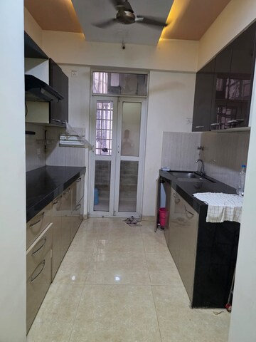 Kitchen in 2.5 BHK Apartment at Runwal Greens, Mulund West – for Sale