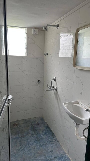 Bathroom in 1 BHK Apartment at Niwara CHS Andheri West, Andheri West – for Rent