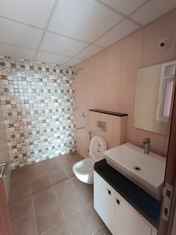 Bathroom in 3 BHK Apartment at Brigade Cornerstone Utopia, Varthur – for Rent