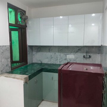 Kitchen in 2 BHK Builder Floor at Khirki Extension – for Rent