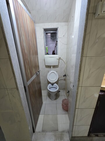 Bathroom in 3 BHK Apartment at Bombay Taximens CHS, Lbs Marg – for Rent