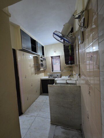 Kitchen in 3 BHK Apartment at Bombay Taximens CHS, Lbs Marg – for Rent