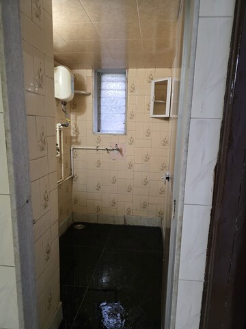 Bathroom in 3 BHK Apartment at Bombay Taximens CHS, Lbs Marg – for Rent