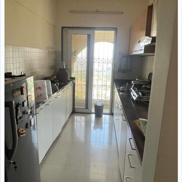 Kitchen in 2 BHK Apartment at Rizvi Cedar, Karur Village – for Rent