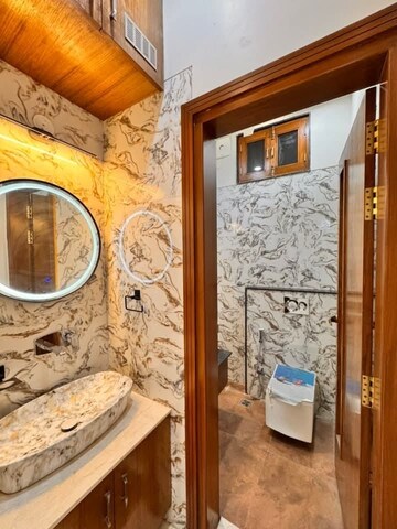 Bathroom in 2 BHK Apartment at Igi Airport Area – for Sale