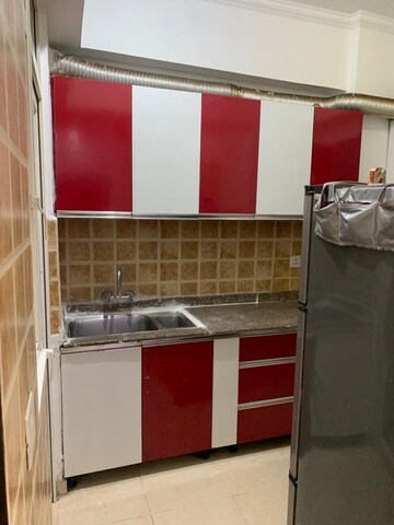 Kitchen in 2 BHK Apartment at Ajnara Grand Heritage, Sector 74 – for Rent
