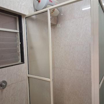 Bathroom in 1 BHK Apartment at Swojas Solitaire, Vasant Vihar – for Rent