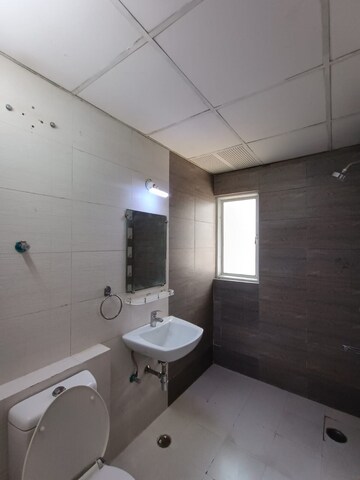 Bathroom in 2.5 BHK Apartment at Antriksh Golf View, Sector 78 – for Rent