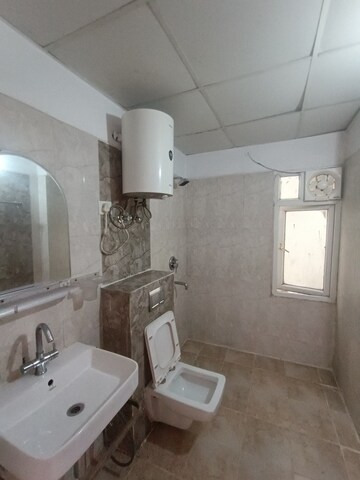 Bathroom in 2.5 BHK Apartment at Antriksh Golf View, Sector 78 – for Rent