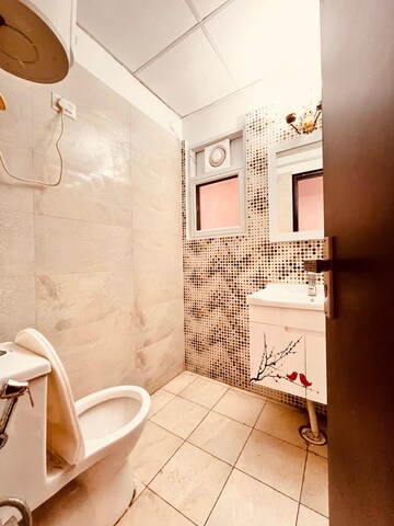 Bathroom in 2 BHK Apartment at Elite Golf Green, Sector 79 – for Rent