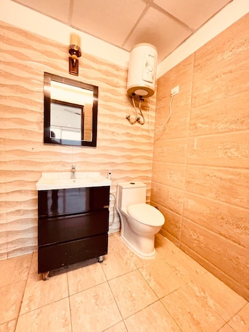 Bathroom in 2 BHK Apartment at Elite Golf Green, Sector 79 – for Rent