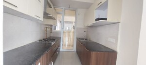 Kitchen in 3 BHK Apartment at Mahagun Mirabella, Sector 79 – for Sale
