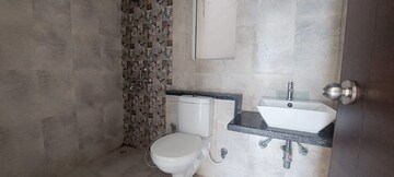 Bathroom in 3 BHK Apartment at Mahagun Mirabella, Sector 79 – for Sale