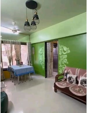 Living Room in 2 BHK Apartment at Haware Dahlia, Kasarvadavali – for Sale