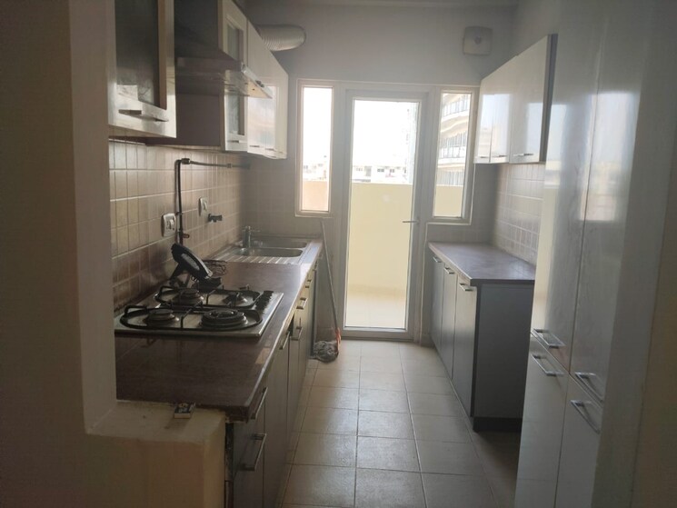 Kitchen, mahagun-moderne 2.5 Bedroom 1250 Sq.Ft. Apartment In Sector 78 Noida 8926789