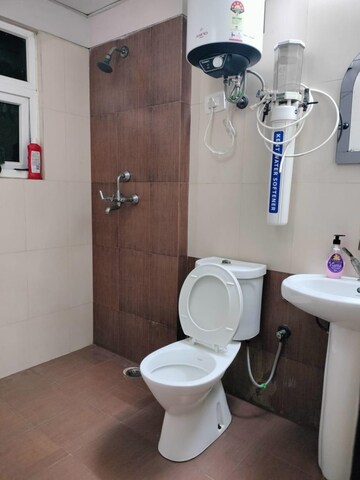 Bathroom in 3 BHK Apartment at Mahagun Moderne, Sector 78 – for Rent