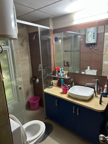 Bathroom in 3 BHK Apartment at Mahagun Moderne, Sector 78 – for Rent
