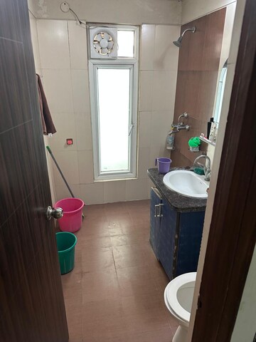 Bathroom in 3 BHK Apartment at Mahagun Moderne, Sector 78 – for Rent