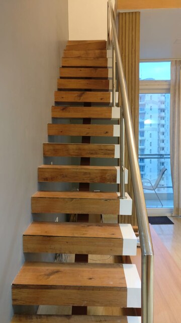 Staircase in 3.5 BHK Apartment at Mahagun Mezzaria, Sector 78 – for Rent
