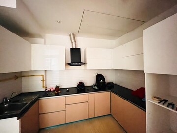 Kitchen in 3.5 BHK Apartment at Mahagun Mezzaria, Sector 78 – for Rent