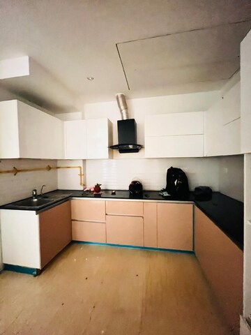 Kitchen in 3.5 BHK Apartment at Mahagun Mezzaria, Sector 78 – for Rent