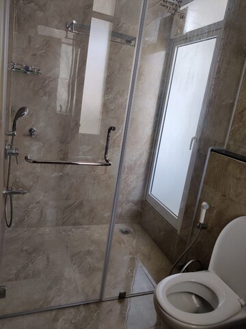 Attached Bathroom in 3.5 BHK Apartment at Mahagun Mezzaria, Sector 78 – for Rent