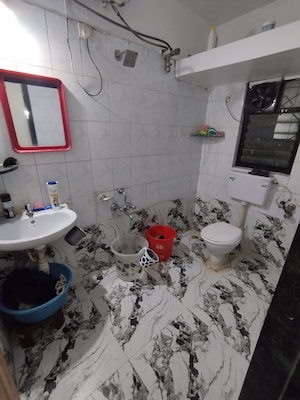 Bathroom in 2 BHK Apartment at Bramha Aangan, Salunkhe Vihar Society – for Rent