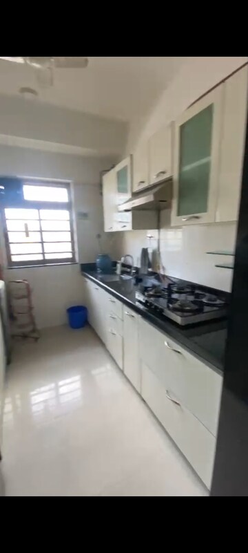 Kitchen in 2 BHK Apartment at Sheth Vasant Oasis, Andheri East – for Rent