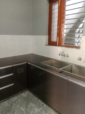 Kitchen in 1.5 BHK Builder Floor at Sector 18 – for Rent