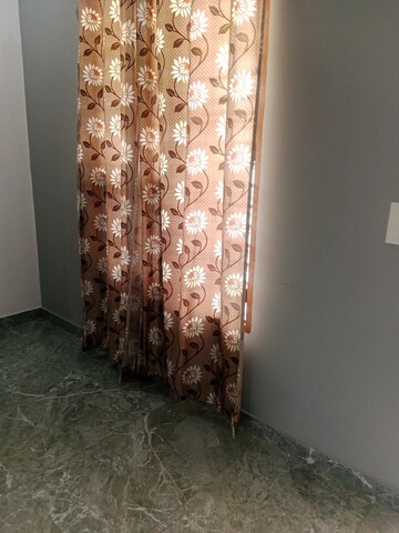 Bedroom in 1.5 BHK Builder Floor at Sector 18 – for Rent