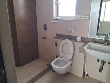 Bathroom in 2 BHK Apartment at Shapoorji Pallonji Joyville Phase 2, Sector 102 – for Rent