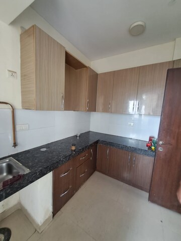 Kitchen in 2 BHK Apartment at Shapoorji Pallonji Joyville Phase 2, Sector 102 – for Rent