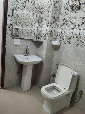 Bathroom in 4 BHK Apartment at Tata Raheja Raisina Residency, Sector 59 – for Sale