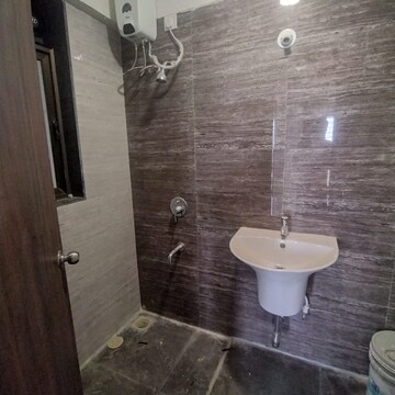 Bathroom in 2 BHK Apartment at Acme Avenue, Kandivali West – for Rent