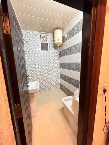 Bathroom in 3 BHK Builder Floor at Sahastradhara Road – for Rent