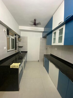 Kitchen in 2 BHK Apartment at Ani Anu Sri Balaji Enclave, Malad West – for Sale