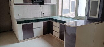 Kitchen in 2 BHK Apartment at ROF Aalayas, Sector 102 – for Rent