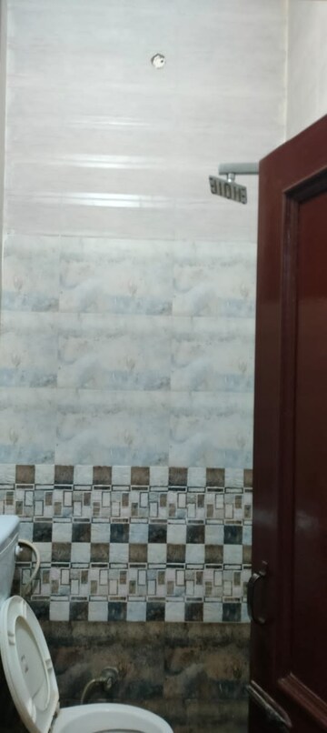 Bathroom in 2 BHK Apartment at Dhakoli – for Sale