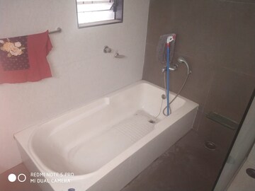 Bathroom in 3 BHK Apartment at Shivtirth Nagar – for Rent