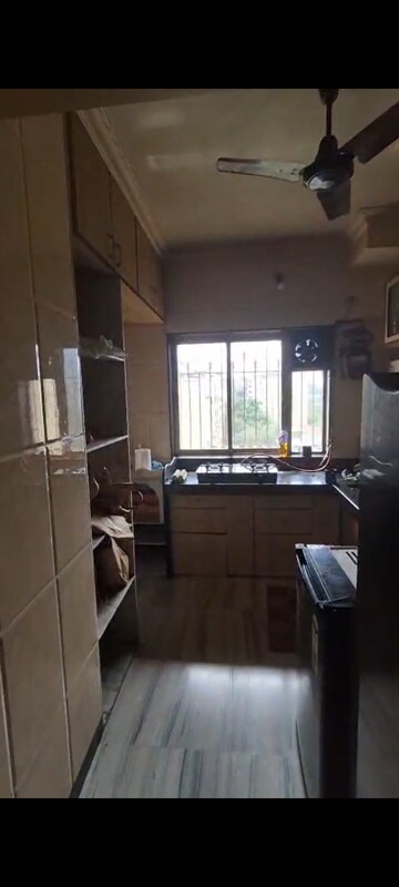 Kitchen in 2 BHK Apartment at Hyde Park Galaxy, Manpada – for Rent