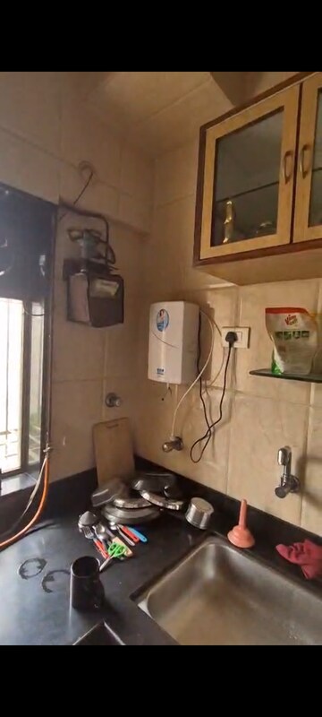 Kitchen in 2 BHK Apartment at Hyde Park Galaxy, Manpada – for Rent