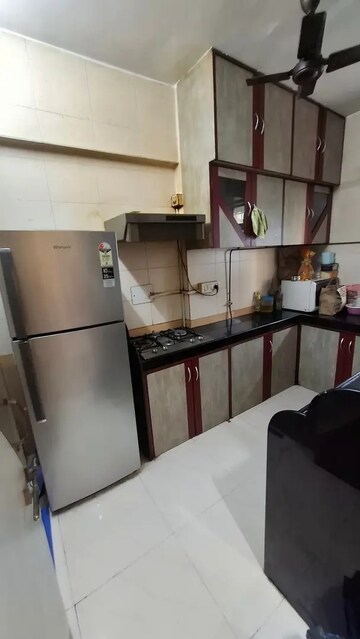 Kitchen in 2 BHK Apartment at Shyam Kunj Goregaon West, Goregaon West – for Rent
