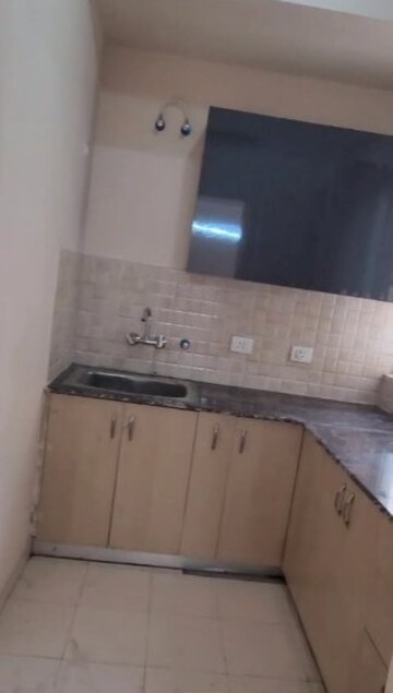 Kitchen in 3 BHK Apartment at Amrapali Dream Valley, Tech Zone 4 Greater Noida – for Rent