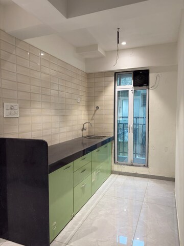 Kitchen in 1 BHK Apartment at Estquire Paradise, Nalasopara West – for Sale