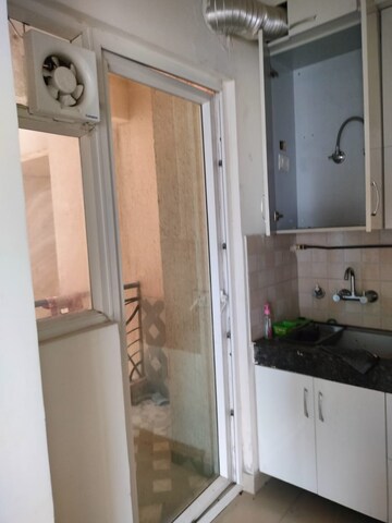 Kitchen in 2 BHK Apartment at Mahagun Mywoods, Sector 16c Greater Noida – for Sale