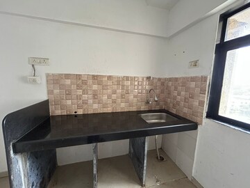 Kitchen in 1 BHK Apartment at Maison Tarangan, Kasarvadavali – for Rent