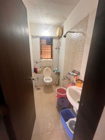 Bathroom in 1.5 BHK Apartment at Runwal Garden City, Balkum Pada – for Sale