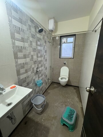 Bathroom in 2 BHK Apartment at Mulund West – for Rent